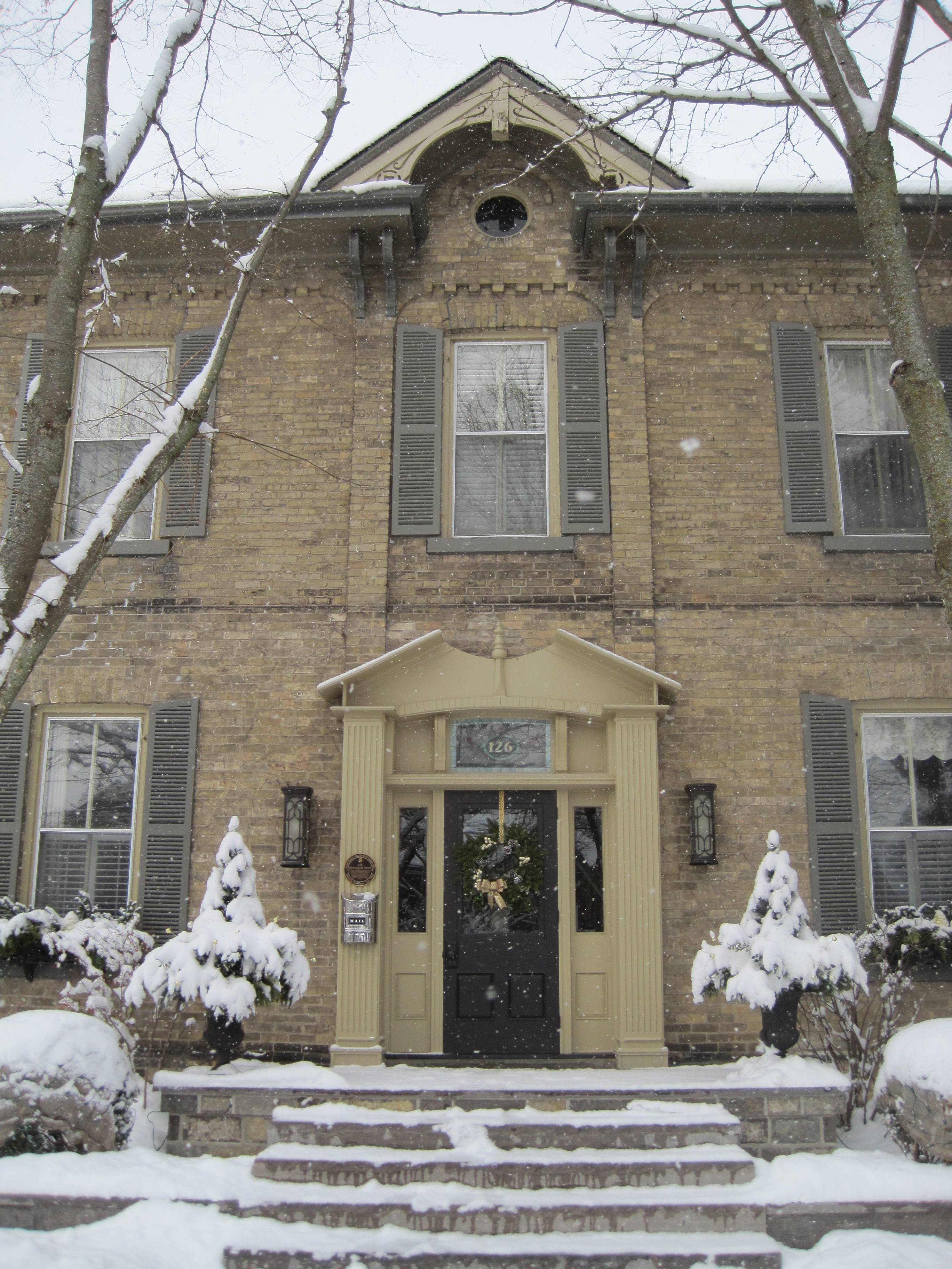Yellow brick Italianate style house