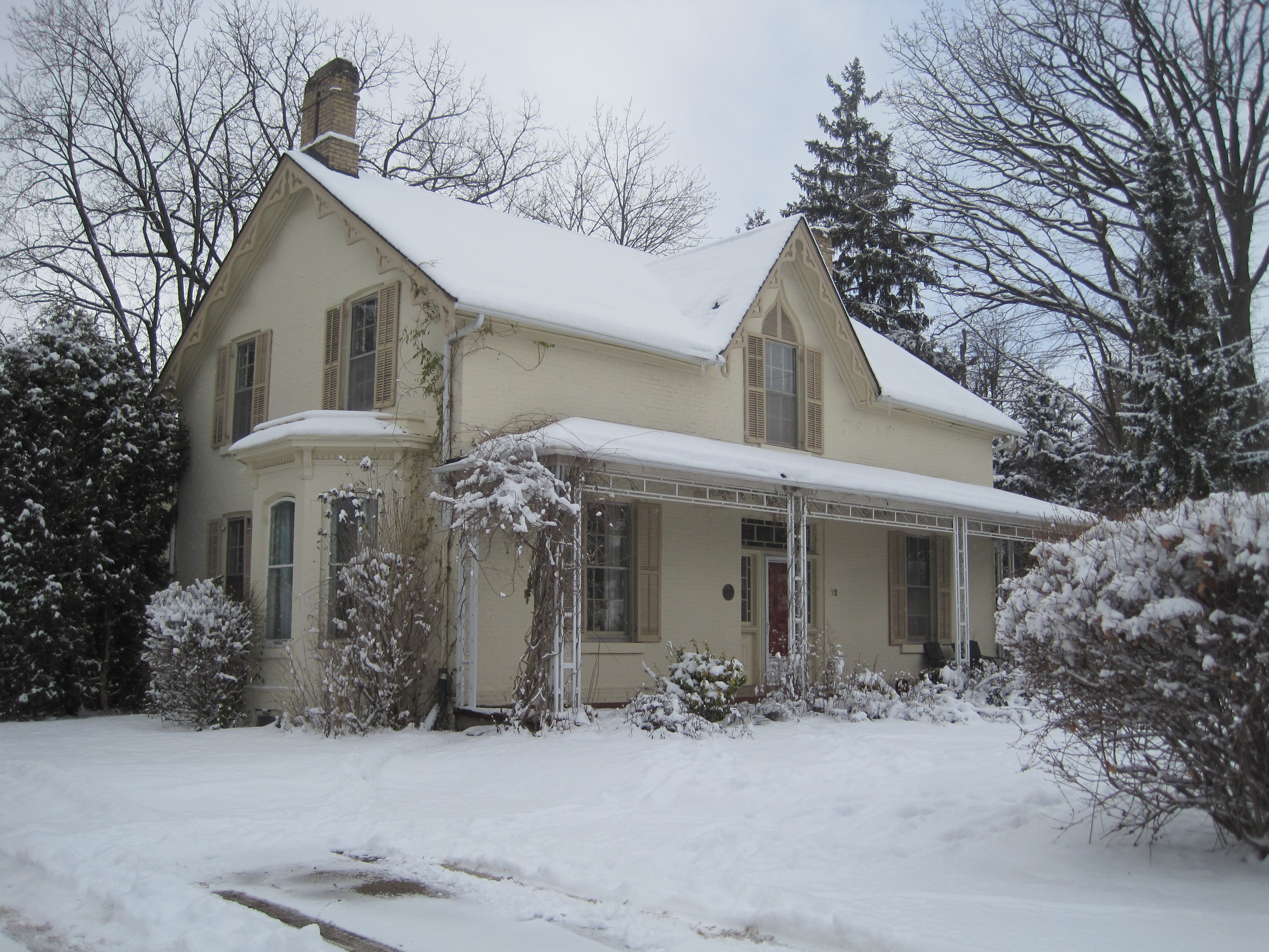 Yellow brick Gothic Revival style house