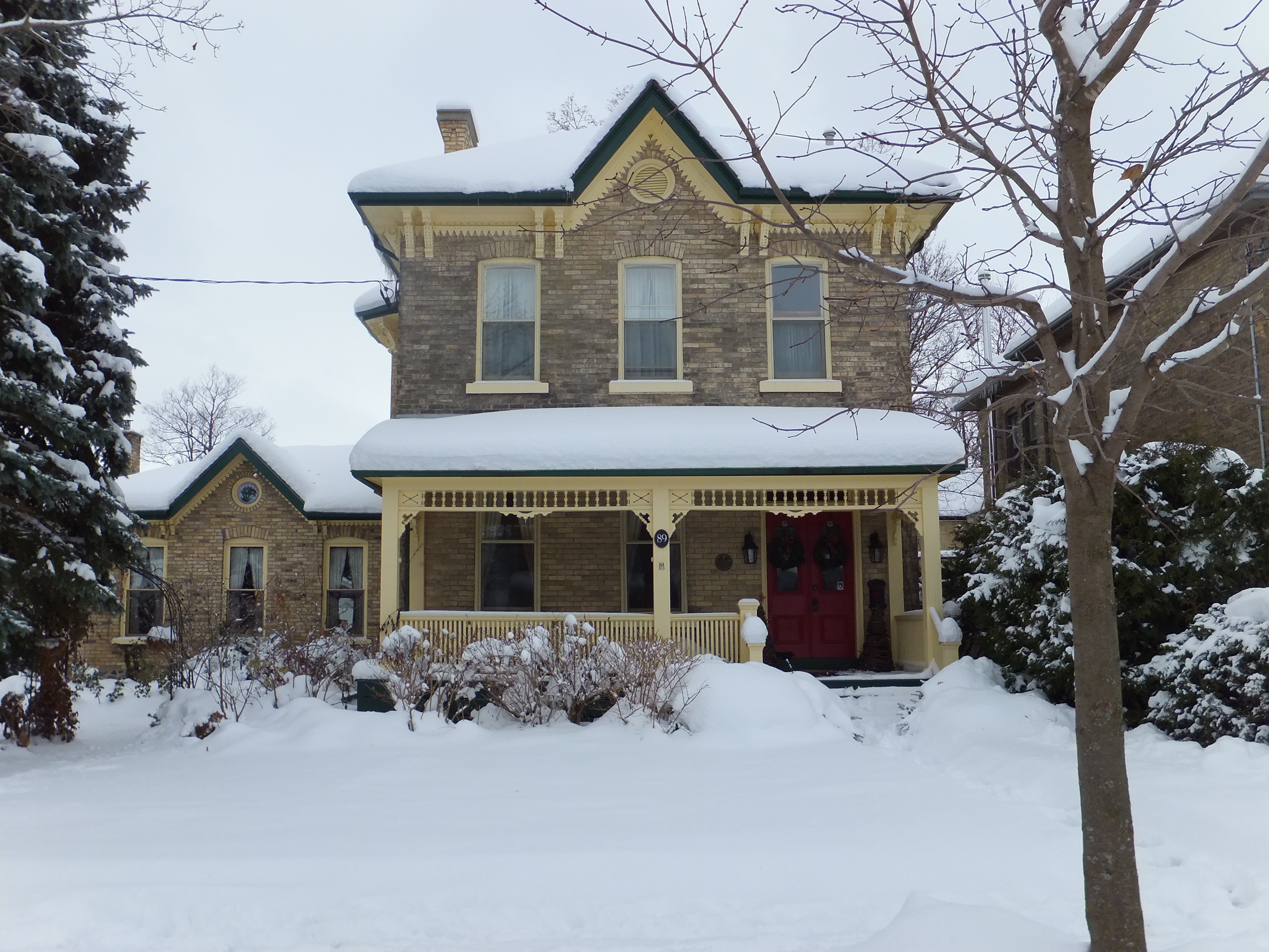 Yellow brick Italianate style house