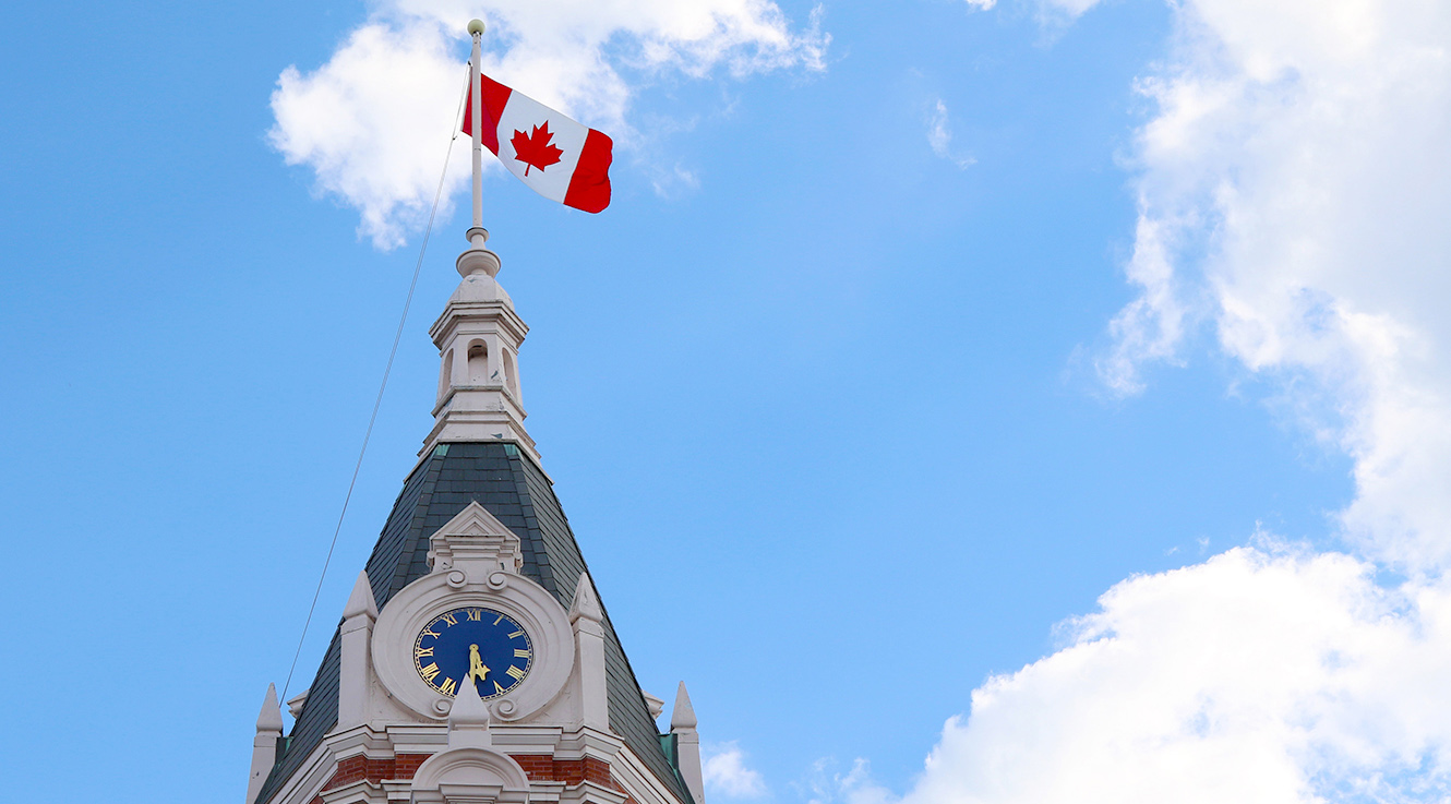 Canada flag on top of City Hall