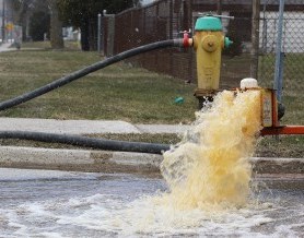 Fire hydrant with water flowing out
