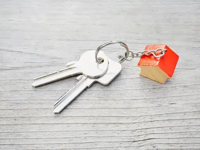 keychain with tiny house on end