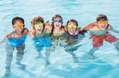 Children swimming in a pool
