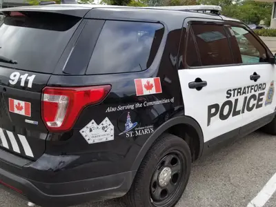 Black and white police cruiser with Stratford Police printed on the side