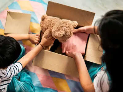 family unpacking box